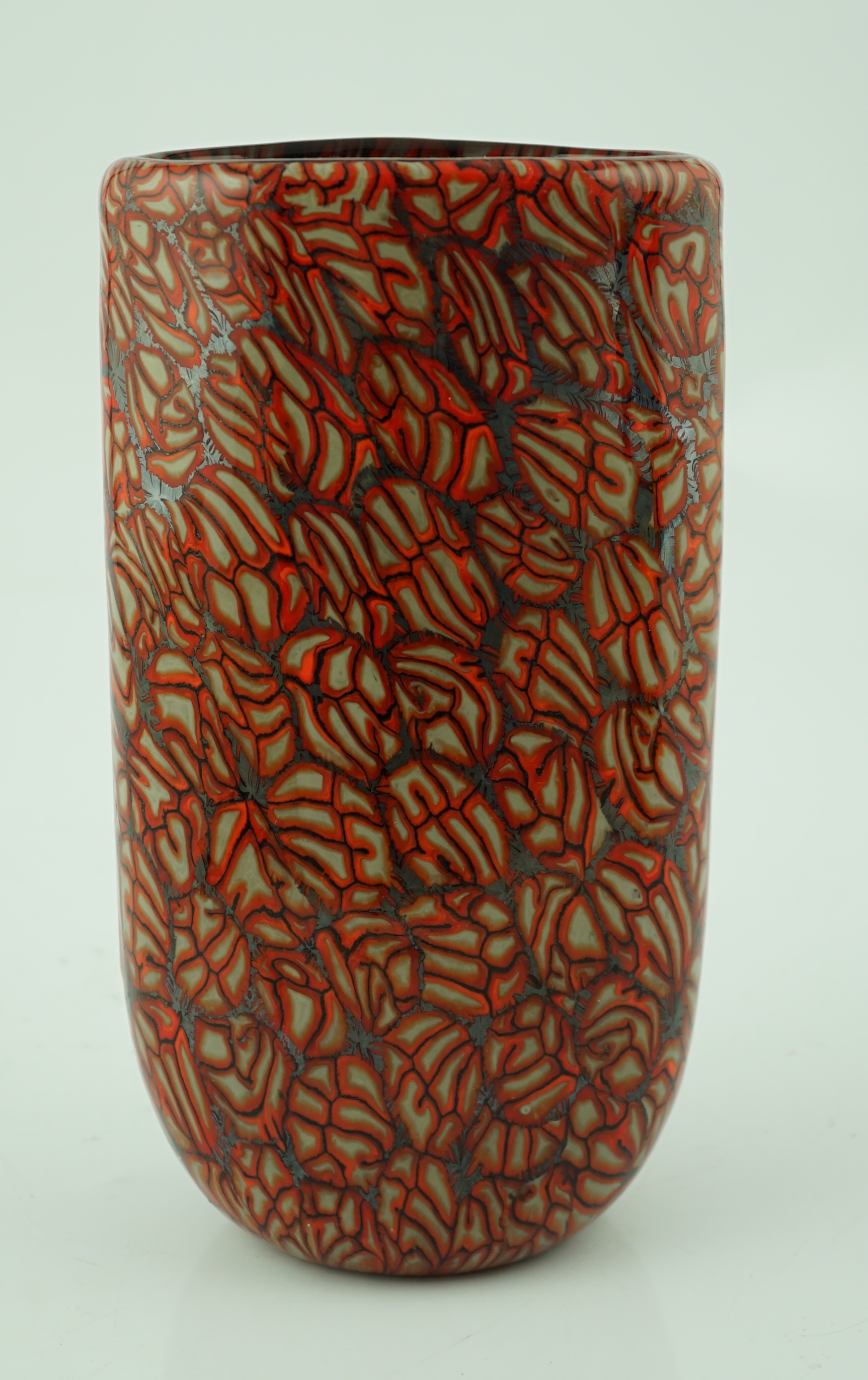 Vittorio Ferro (1932-2012 A Murano glass Murrine vase, cup shaped decorated with red and white stylised flowers, on a black ground, signed, 28.5cm, Please note this lot attracts an additional import tax of 20% on the ham